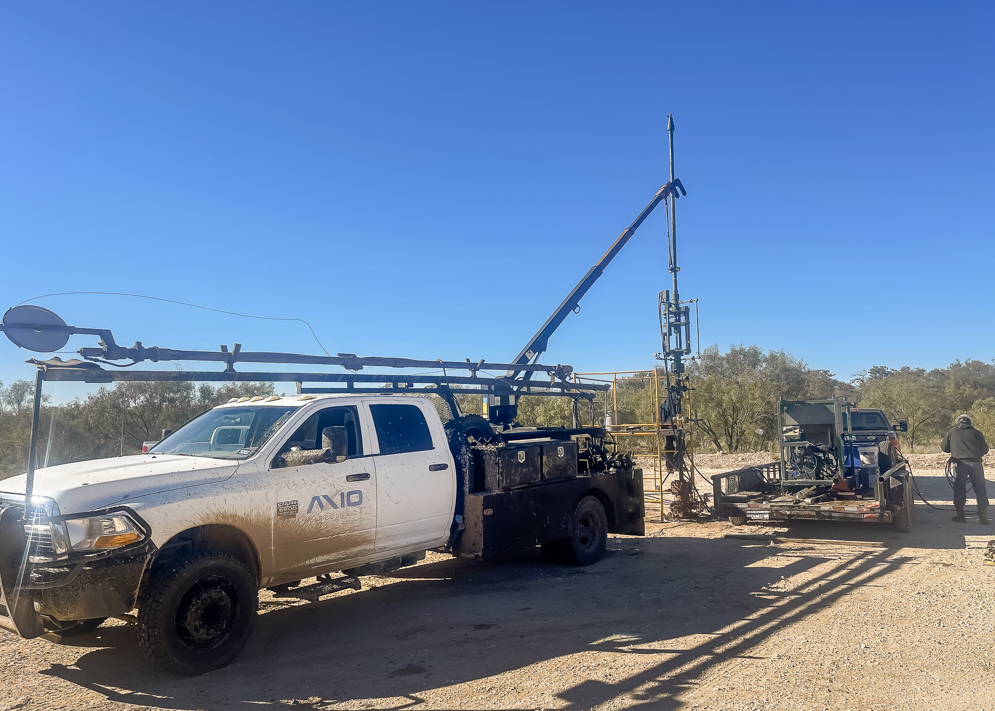 Technician performing gate valve service in Texas oilfield